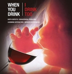 foetus with glass of wine